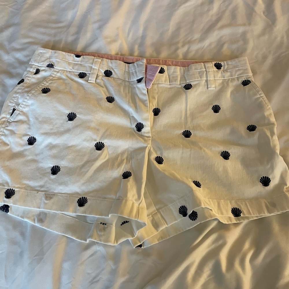 White shorts with blue scallops